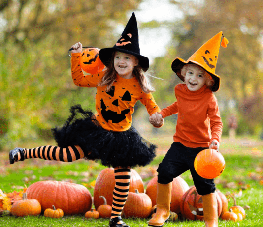 kids in pumpkin outfits