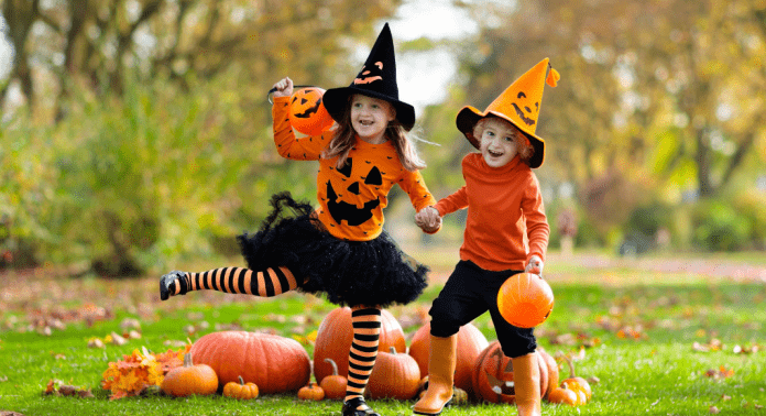 kids in pumpkin outfits