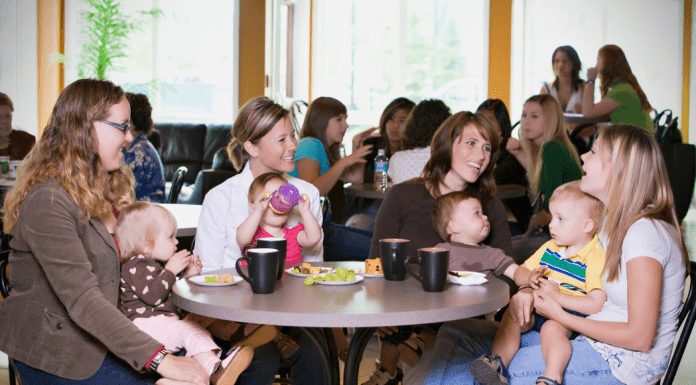 women around table at moms group