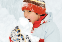 kid eating snow