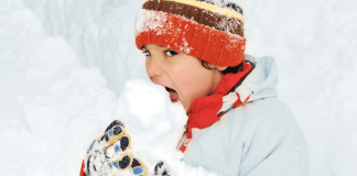 kid eating snow